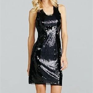 MSSP Black cocktail sheer at the hem and sleeve of the dress